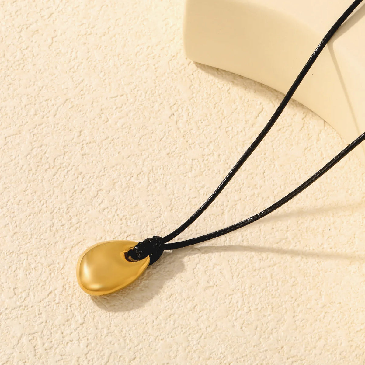 Minimalist Irregular Water Drop Matte Gold Pendant Black Rope Cord Necklace | 18K Gold Plated | Wholesale MOQ 12