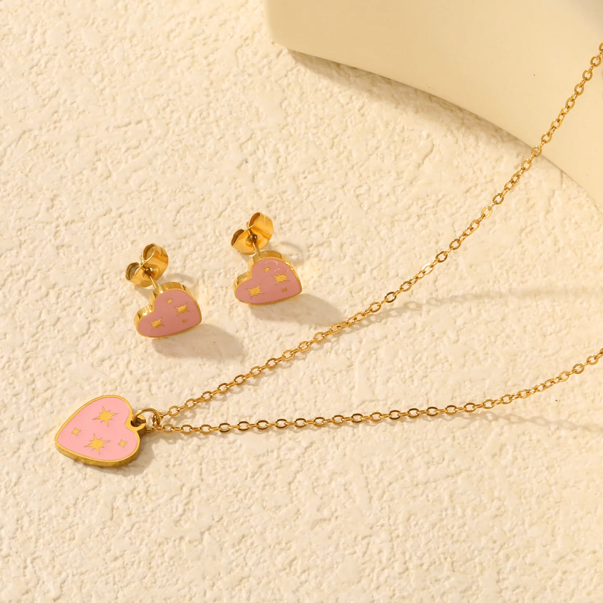 Sweet Pink Star Heart with Starburst Pattern Jewelry Set | Necklace & Stud Earrings | Wholesale MOQ 12