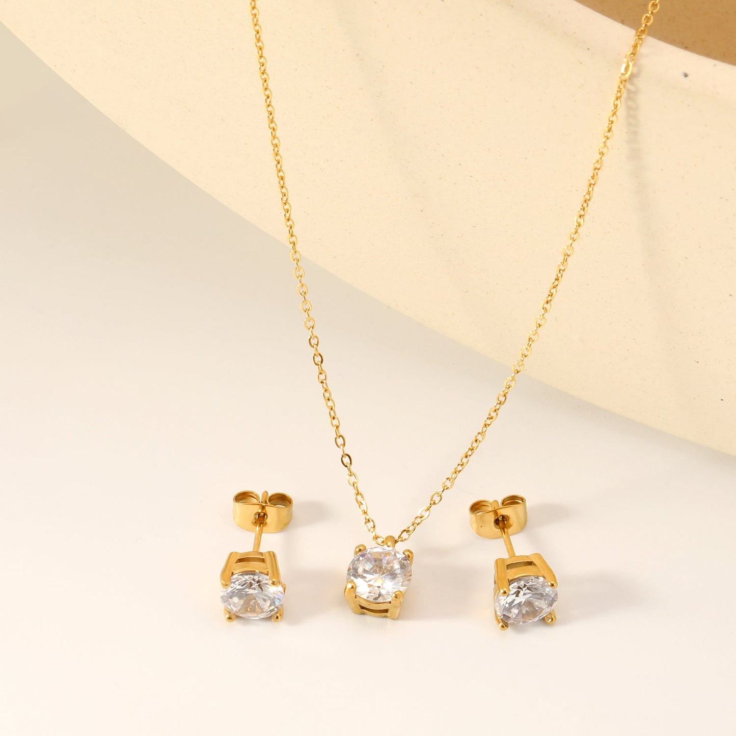 Round white zirconium set Gold-colored earrings:7mm Pendant:7mm 0.3 cross chain*40+5cm+6mm round plate