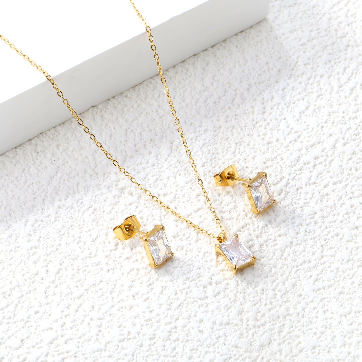 Rectangular white zirconium set Gold-colored earrings:5*7mm Pendant:5*7mm 0.3 cross chain*40+5cm+6mm round plate