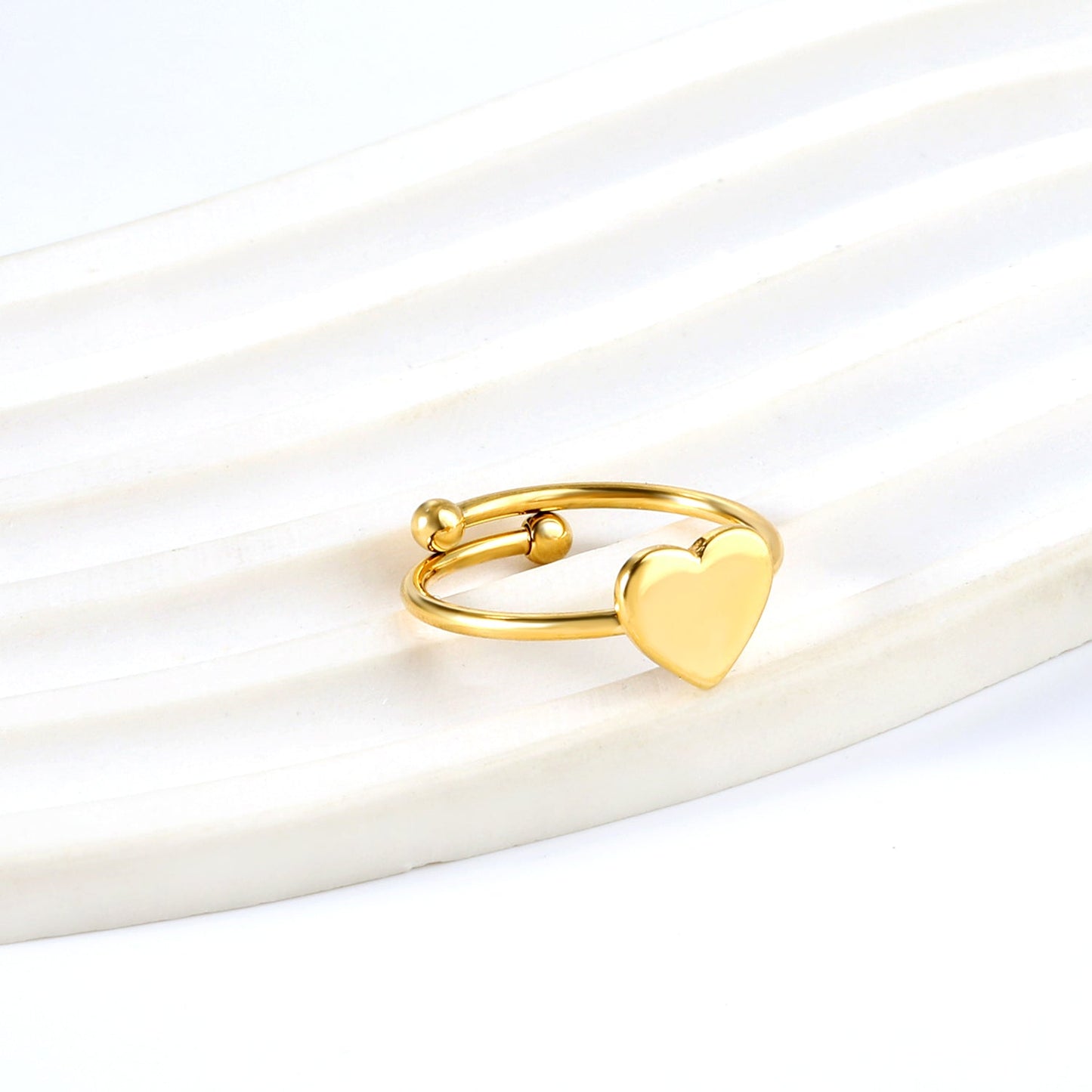 Wholesale Heart shaped ring with an open cylindrical end