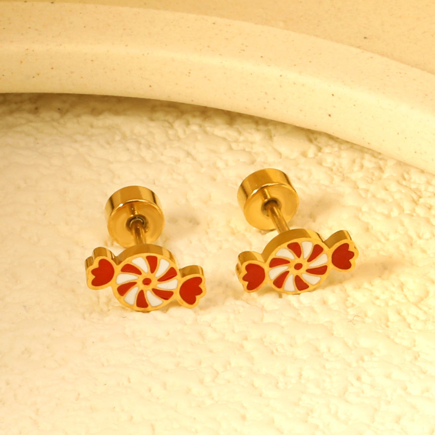 Children's Christmas carousel candy shape twist plug earrings gold color
