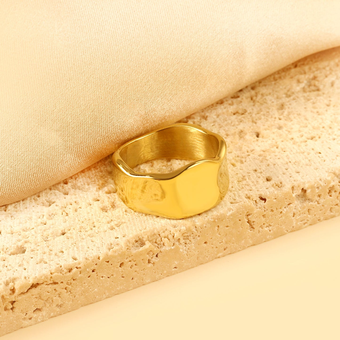 Exaggerated style ring with an oversized curved surface