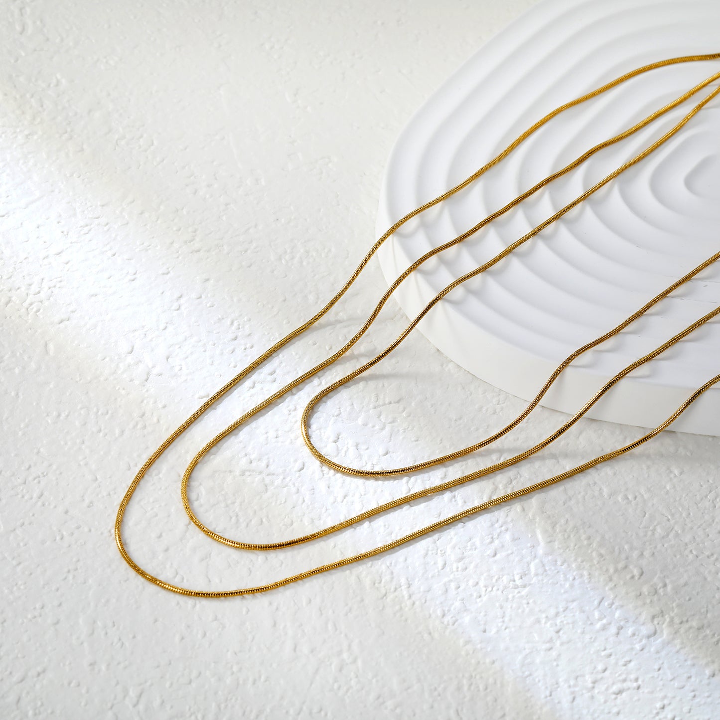 Bulk Gold-Tone Stainless Steel Snake Chain Necklace (0.9mm) – Wholesale Jewelry for Retailers & Resellers