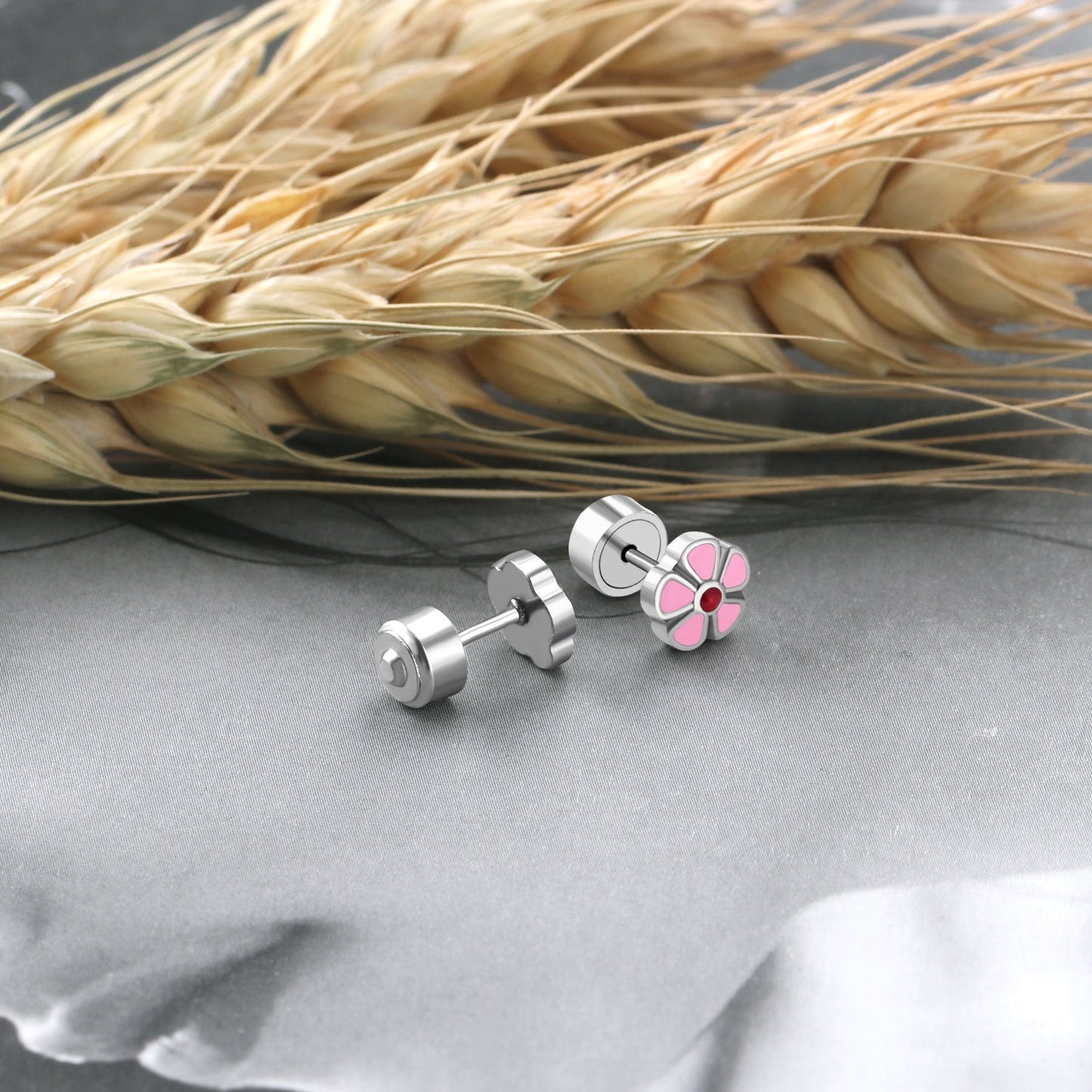 12 pairs 6.5mm Steel Flower Pink Clapper Plug Earrings