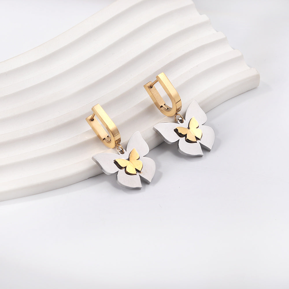 Gold coloured U-shaped ear clips with graduated gold sized butterfly studs