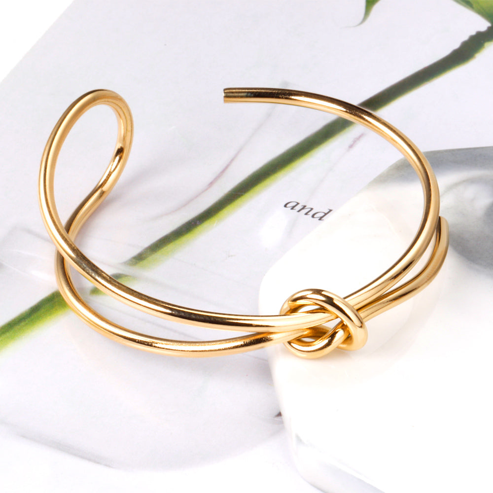 Wholesale Hard bangle with minimalist clasp shape in gold color