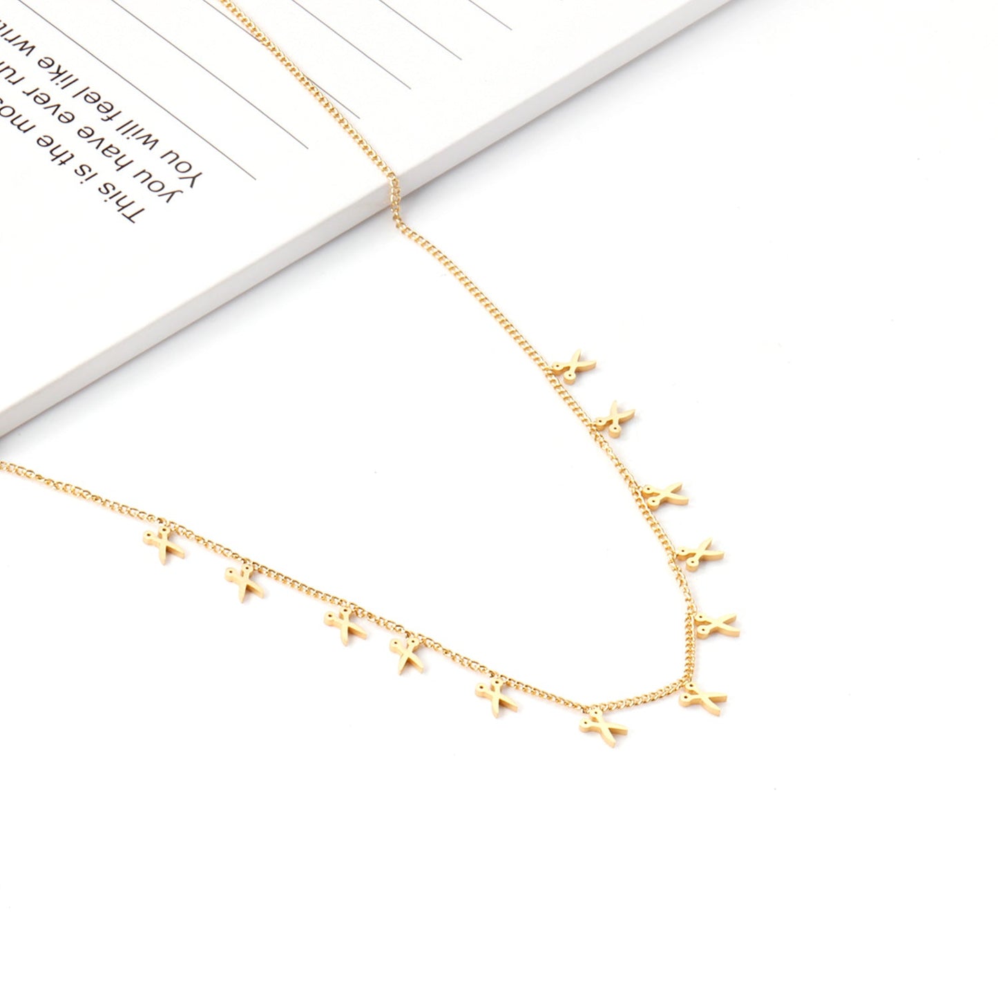0.3 Side chain 40+5cm welded 12 necklaces with scissors 3.3*4.5mm in glossy finish.