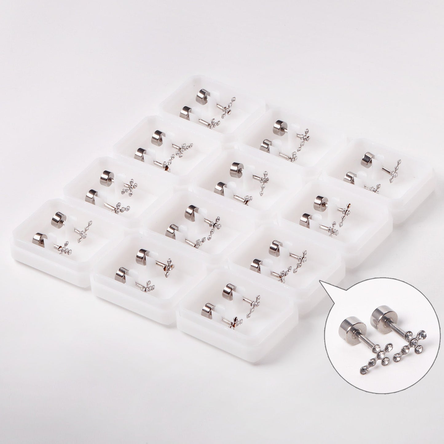 12 pairs steel/gold cross & 6 small diamonds screwbacks with diamonds