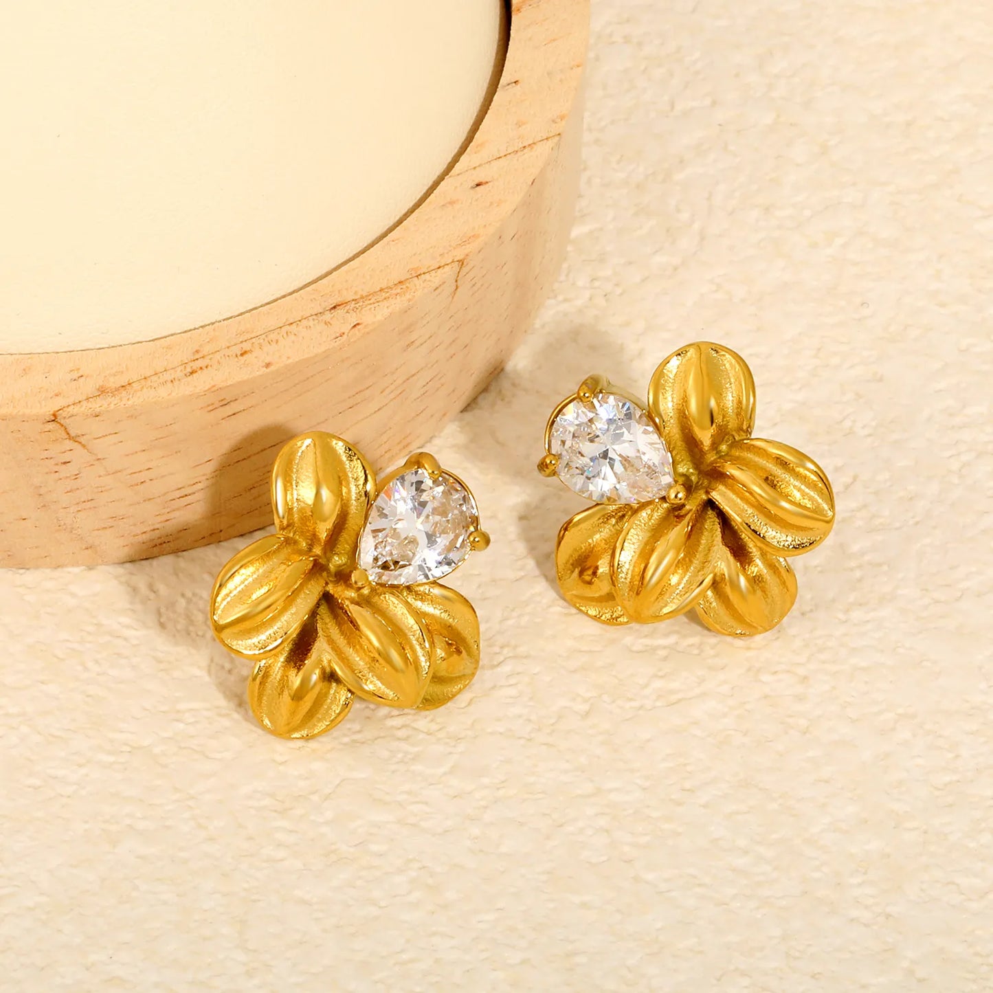 Matte Five-Petal Plumeria Flower Stud Earrings with Pear CZ | 18K Gold Plated Hypoallergenic Stainless Steel Floral Statement Earrings | Wholesale MOQ 12