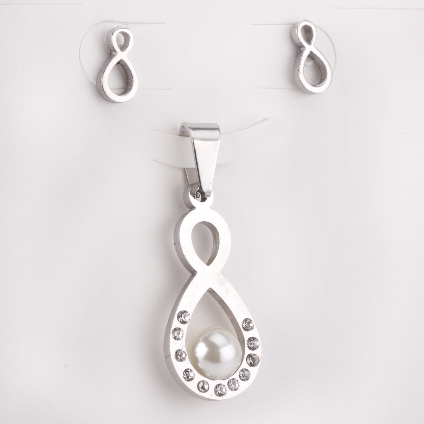 Steel/golden figure 8 cut faceted jewelry set with pearl