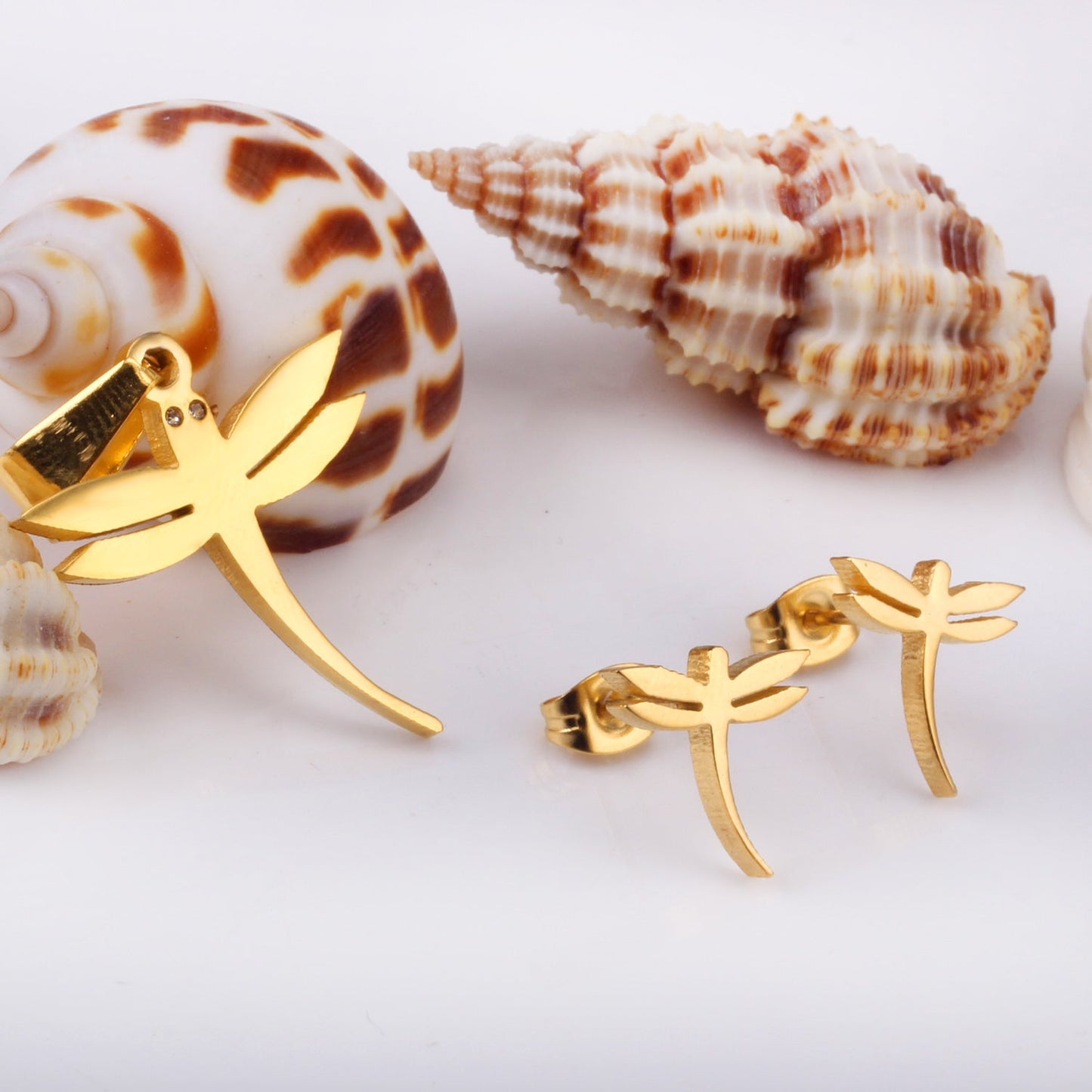 Gold/steel dragonfly shaped tail with curved cut jewelry set without diamonds