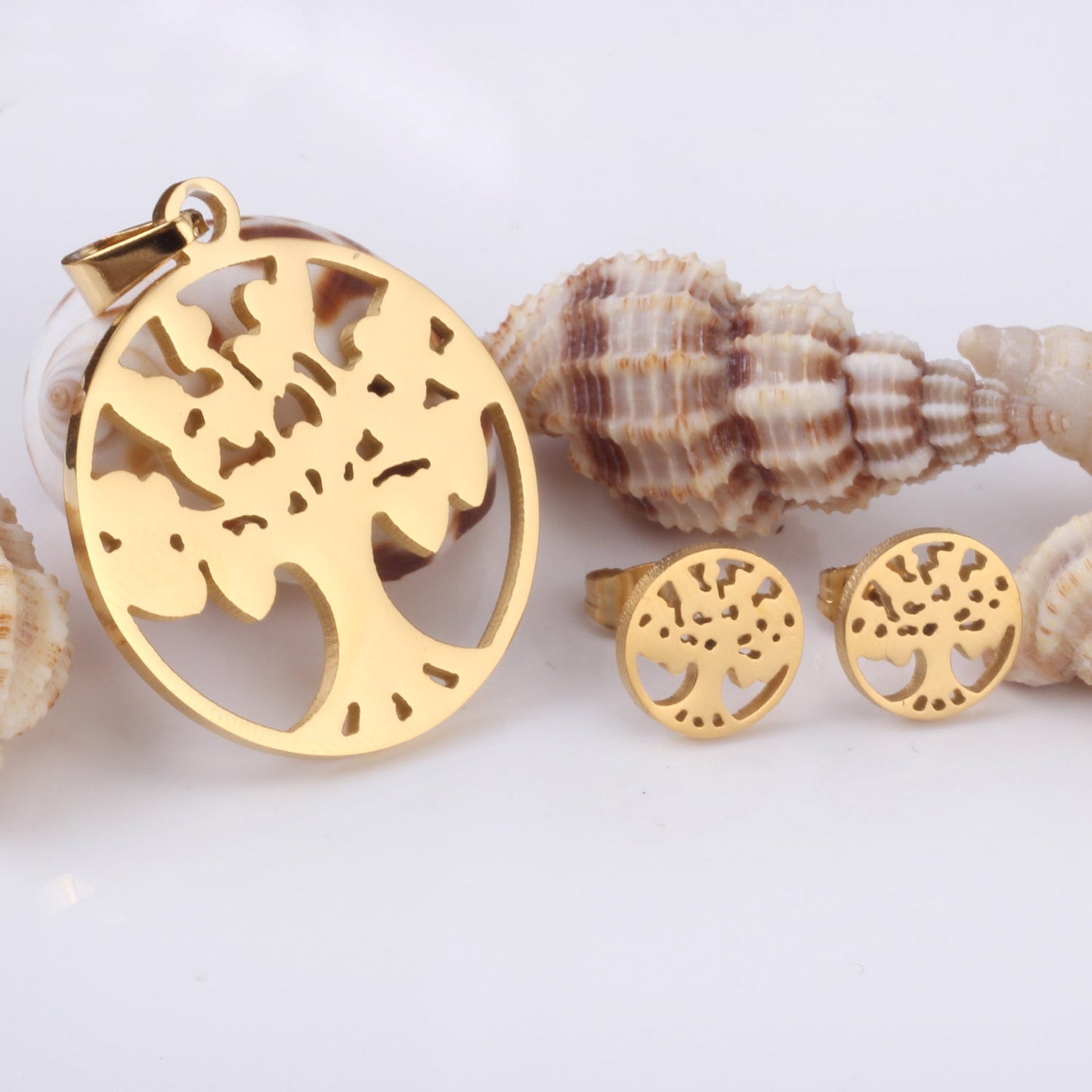 Gold/steel set of hollowed out tree shapes surrounded by circles