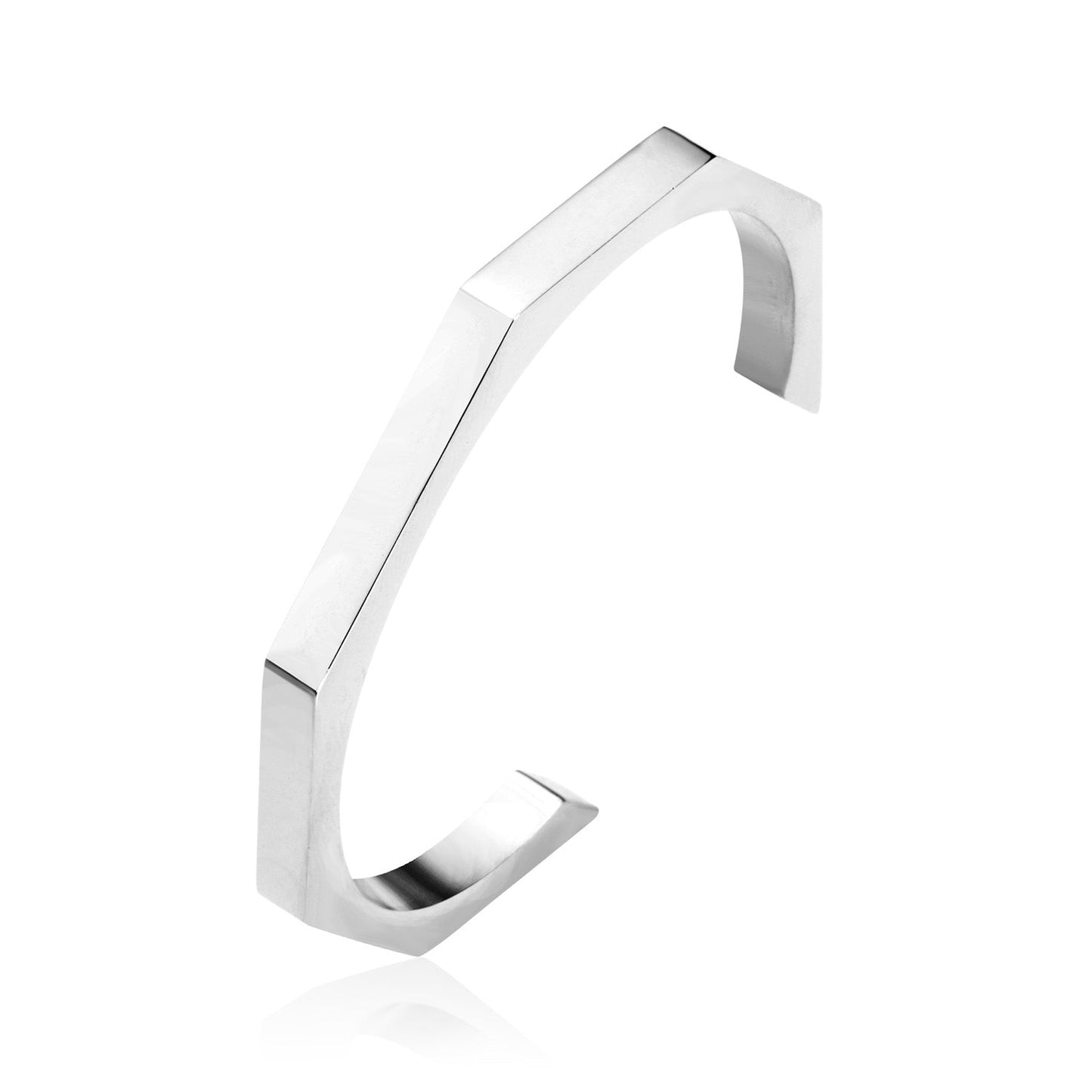 Three colors of black gold-tone steel with an angular face on an open-end rigid bracelet.