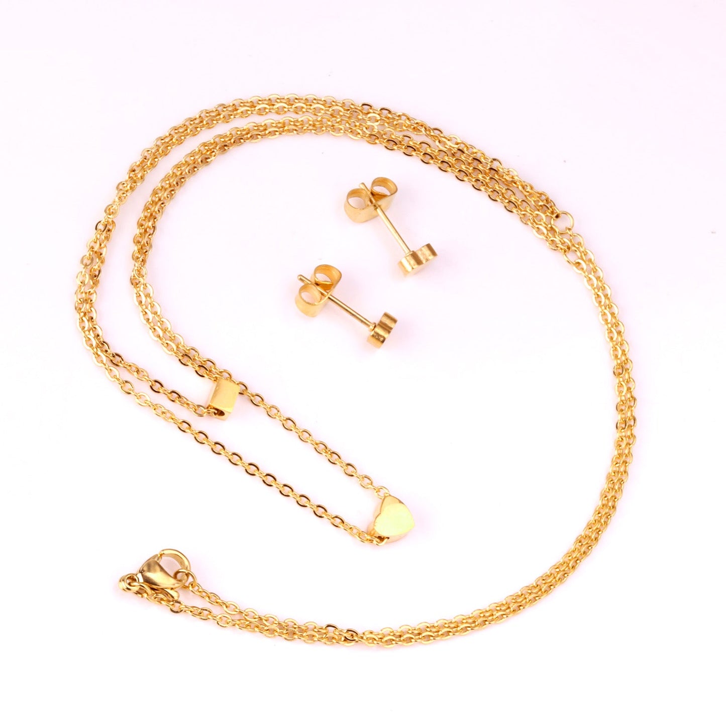 Gold/steel two-chain pendant jewelry set with rectangle and heart shapes