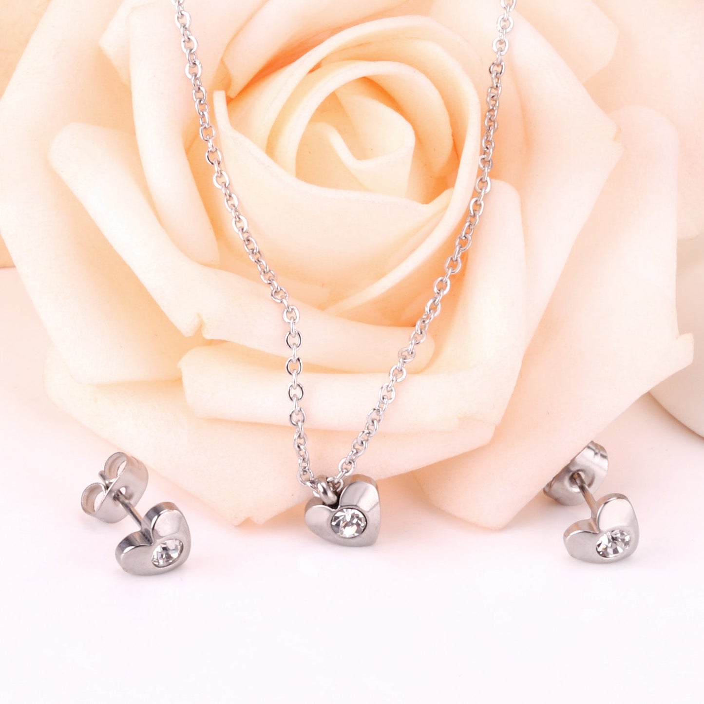 Gold/Steel Heart Jewelry Set with Diamonds in the Middle