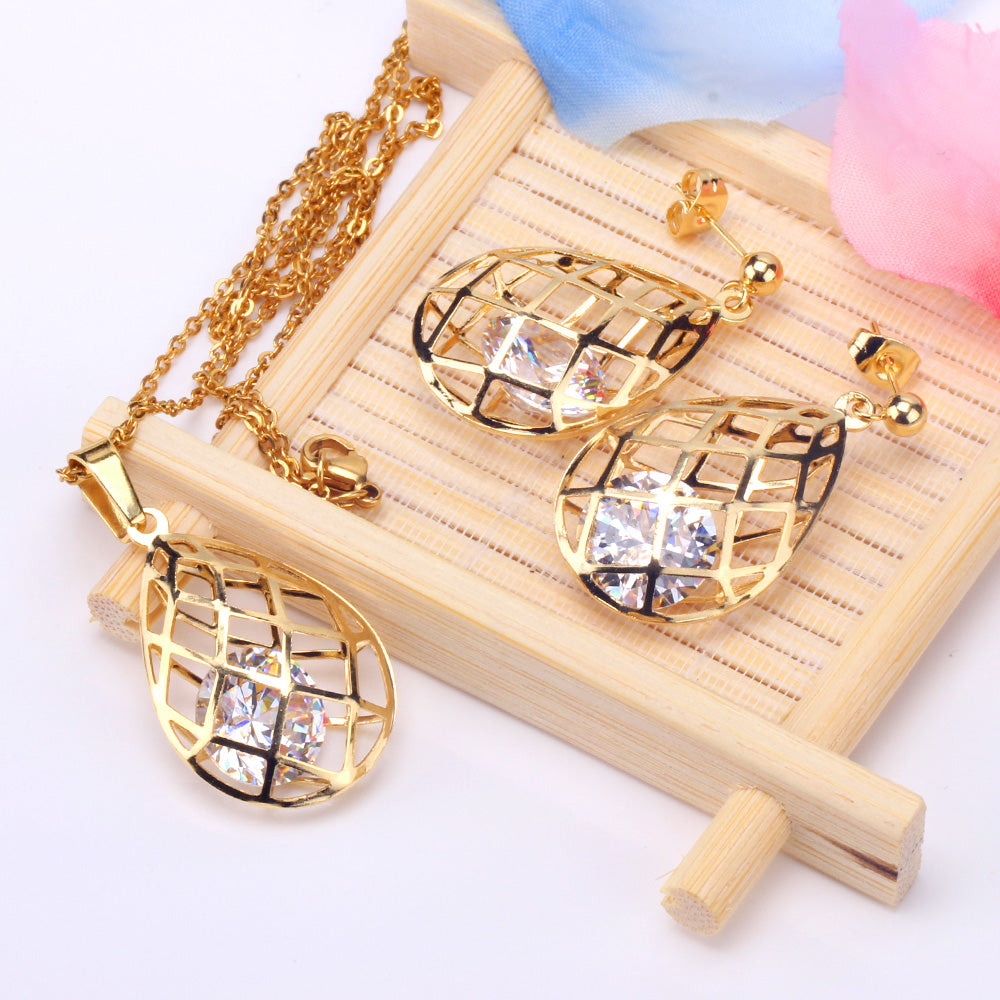 Gold/steel emery mesh hollowed out teardrop interior + diamond jewelry set