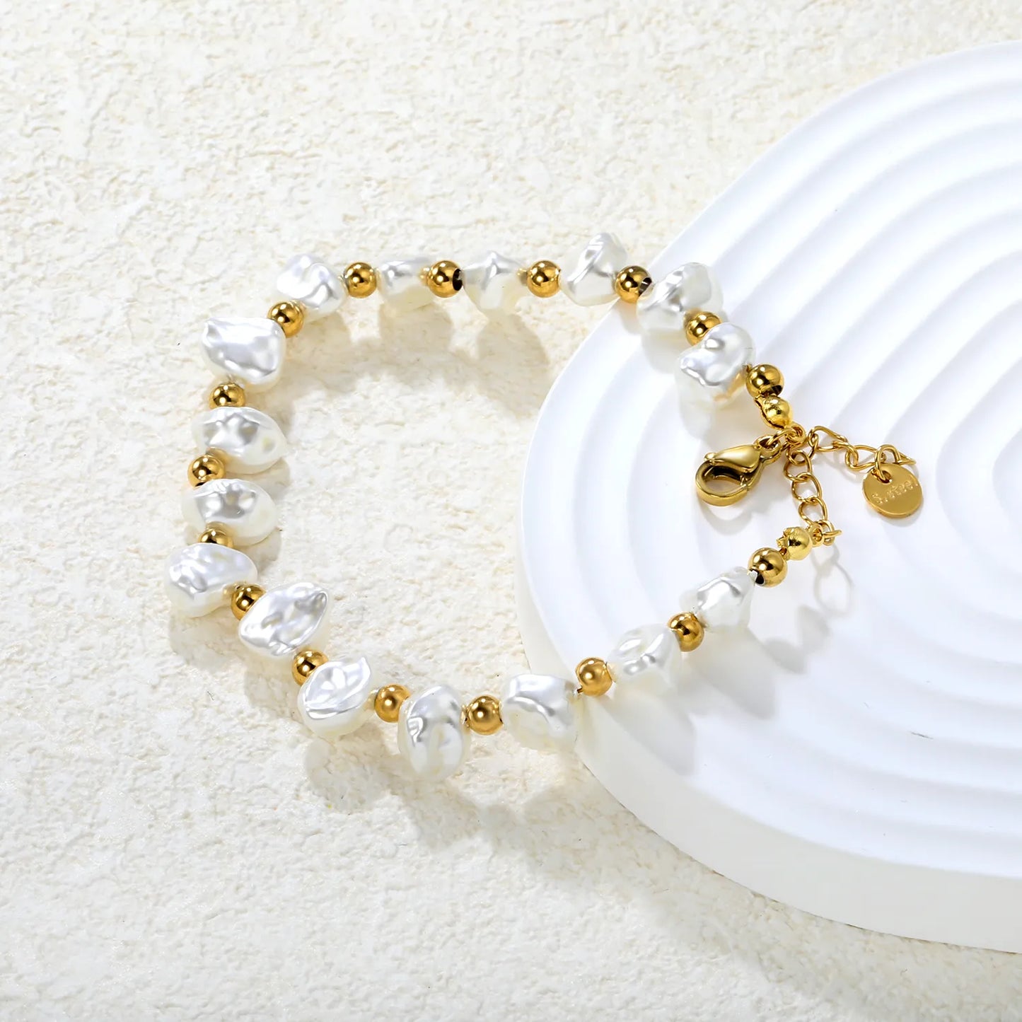 Gold-Tone Stainless Steel Shell Charm Bracelet for Wholesale | 8x9mm Irregular Beads, 4mm Spacers