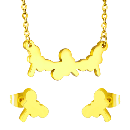 Jewelry set in gold/steel with smooth surfaces and irregular cuts