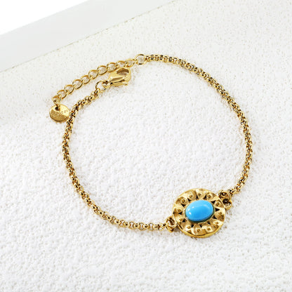 15.5mm Round Cake with 6*8.3mm Oval Bluestone Bracelet 17+3cm Gold color