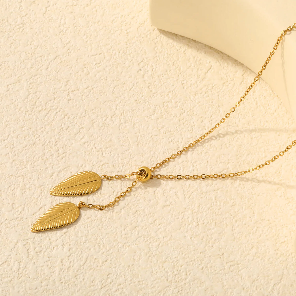 Double Textured Feather Leaf Pendant Adjustable Y Necklace | 18K Gold Plated Stainless Steel | WholesaleMOQ 12