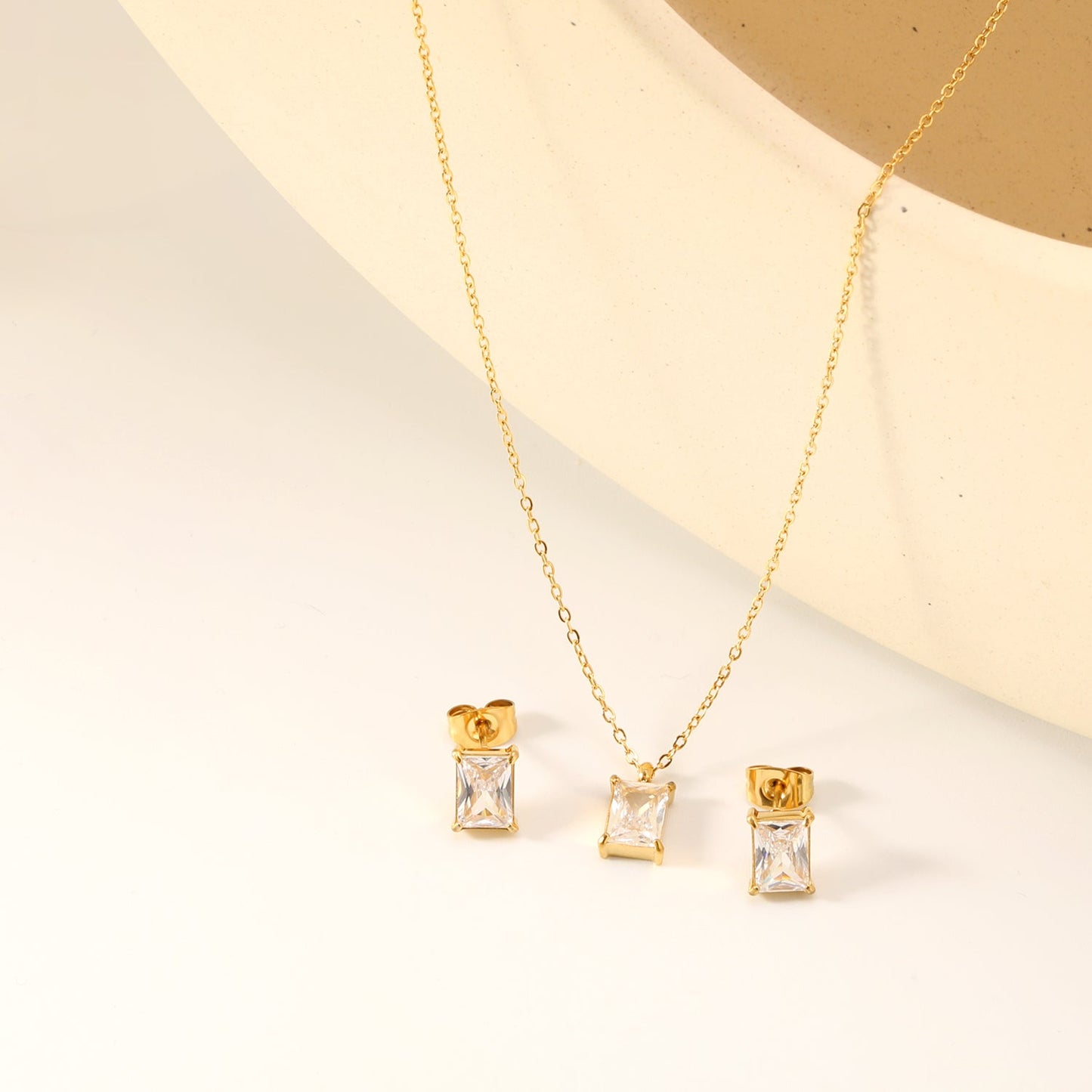 Rectangular white zirconium set Gold-colored earrings:5*7mm Pendant:5*7mm 0.3 cross chain*40+5cm+6mm round plate