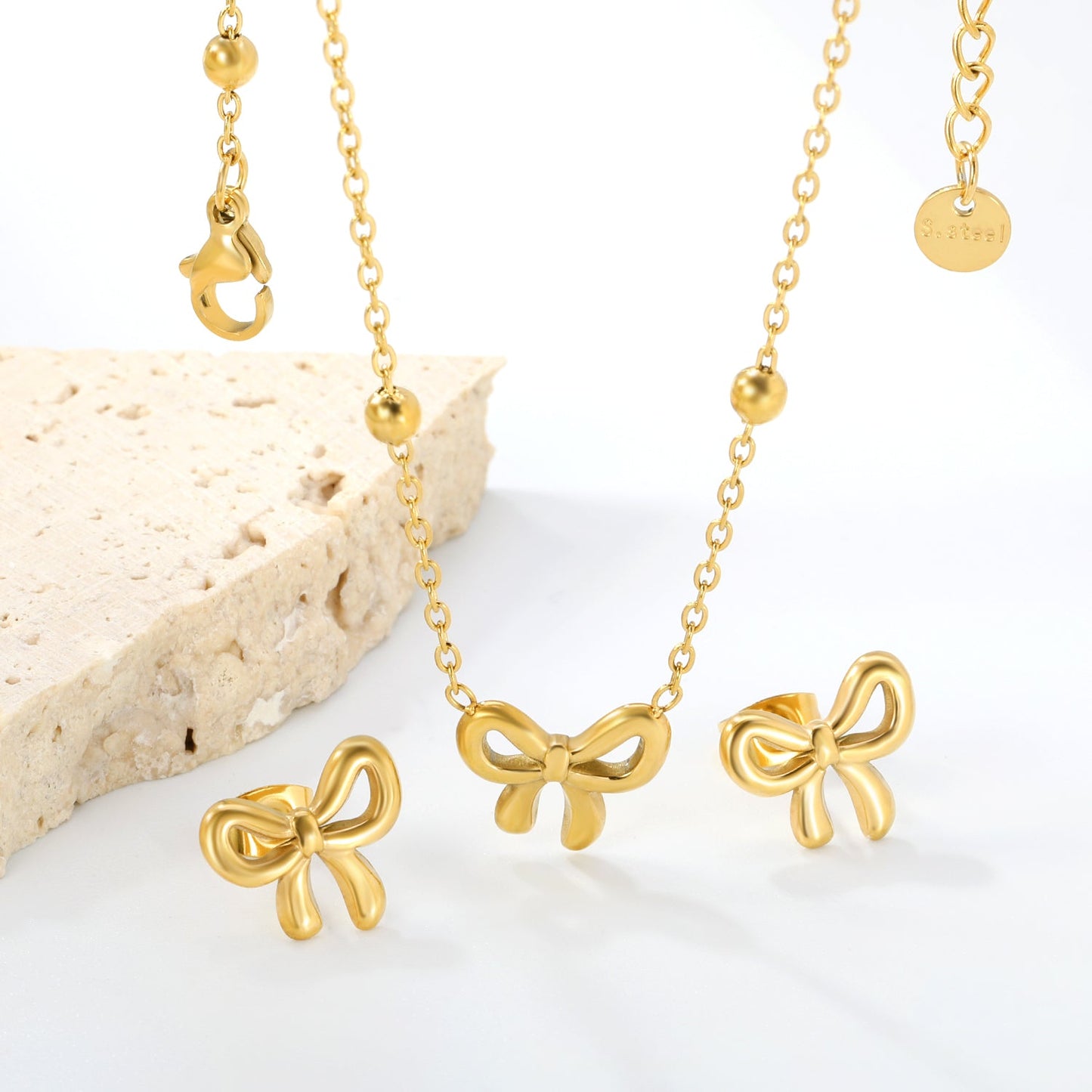 Bowtie set Golden earrings:13.2*11.2mm Pendant:13.2*11.2mm 40+5cm+6mm round plaque