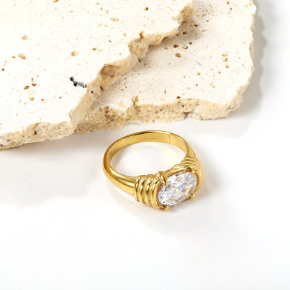 Oversized white oval diamonds on a threaded band ring.