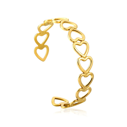 Bracelet with multiple openings in the shape of hollowed-out hearts linked together.