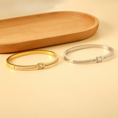 Bracelet combining two rectangular shells & diamond-set surfaces