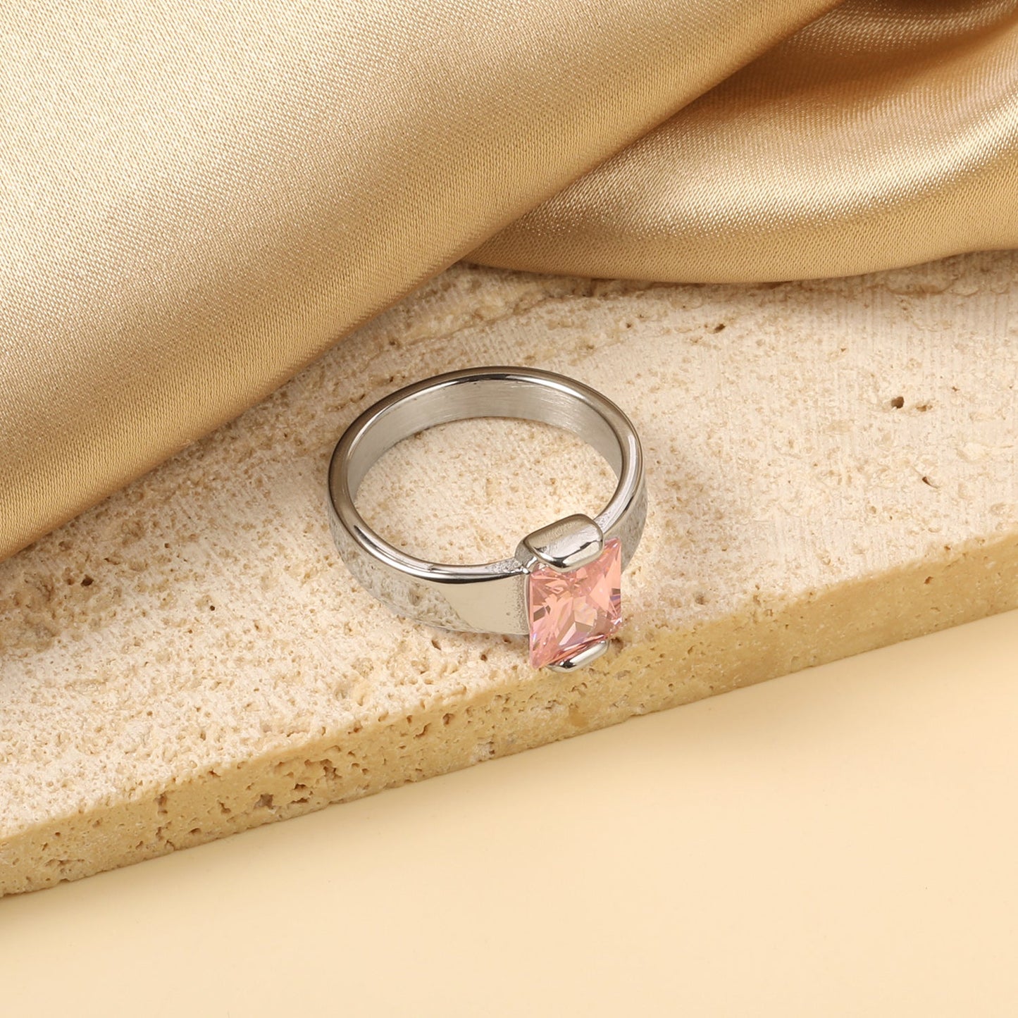 Square solitaire ring with pink diamonds