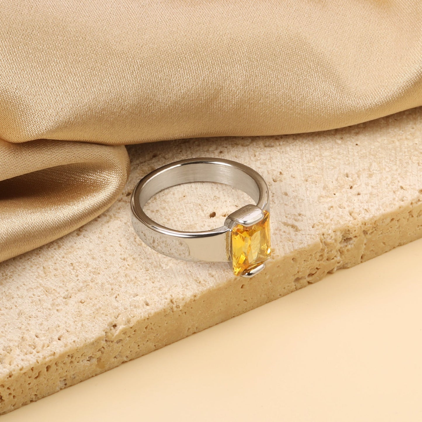 Square solitaire ring with yellow diamonds