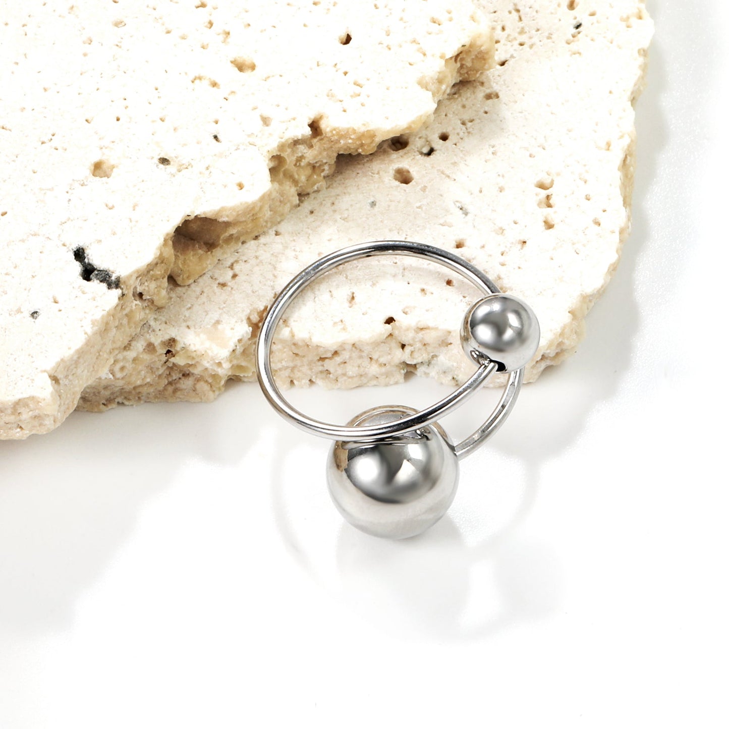 Uniquely designed large and small orb open rings