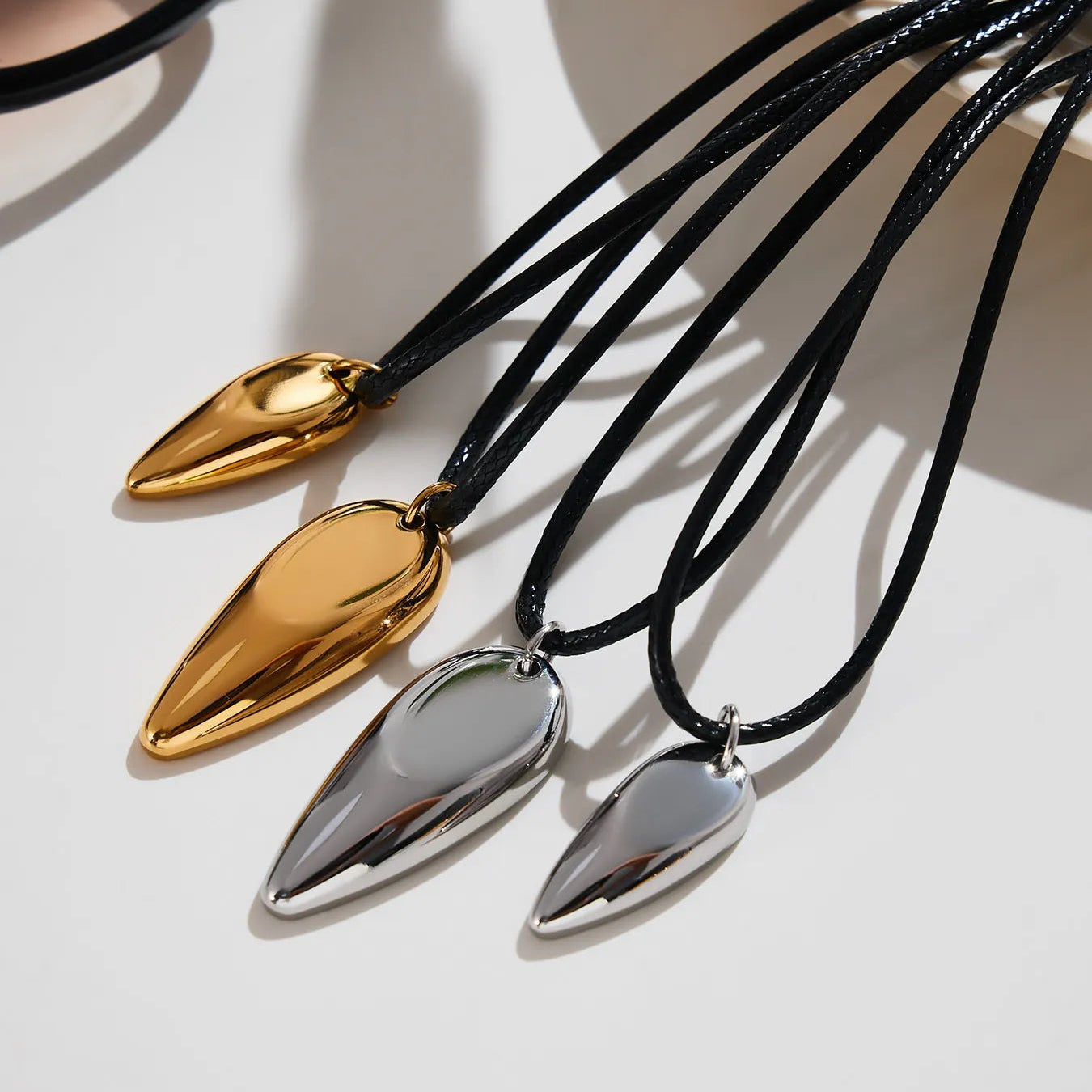 Wholesale Teardrop Pendant Leather Necklace (Gold/Silver) | 90cm Adjustable Cord | 15x35mm Sculpted Drop | MOQ 12