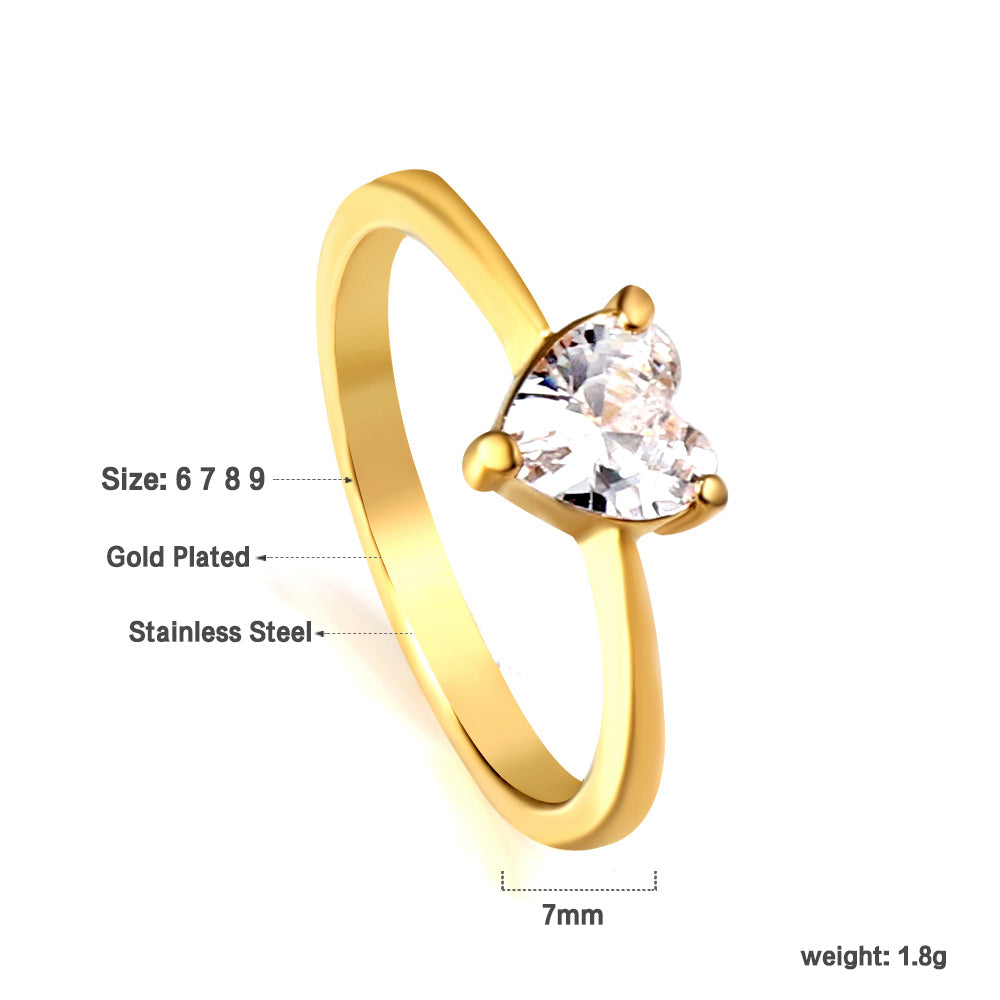White diamond heart shaped three claw ring