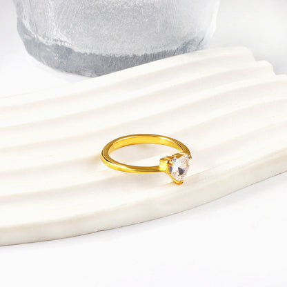 White diamond heart shaped three claw ring