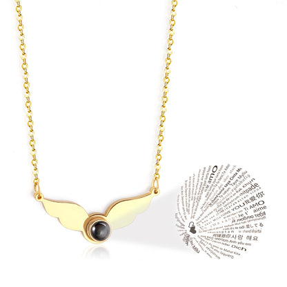 Necklace with a black circle in the center of the wings