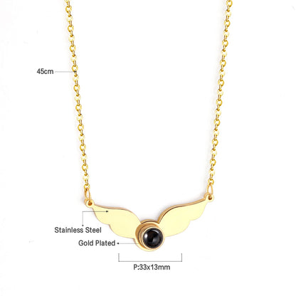 Necklace with a black circle in the center of the wings