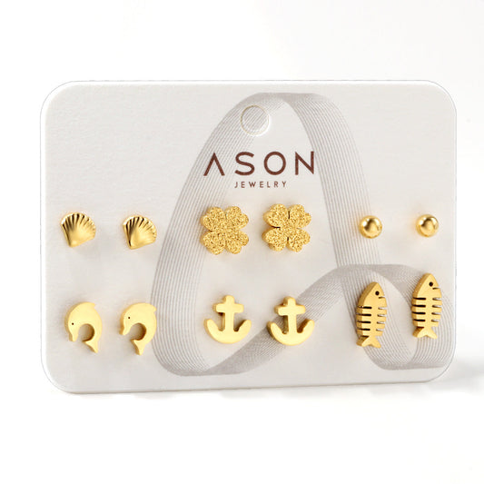 Six pairs of mixed card mounted cut-out shell / fishbone / dolphin stud earrings gold color