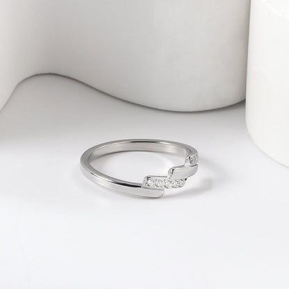 A beautifully designed ring with small round diamonds.