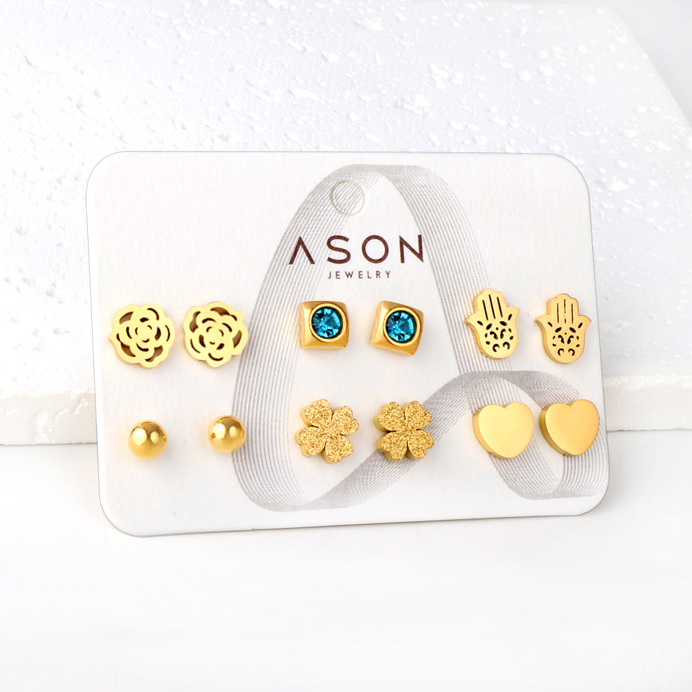 Six pairs of mixed card mounted cut-out palm / glossy heart stud earrings gold color