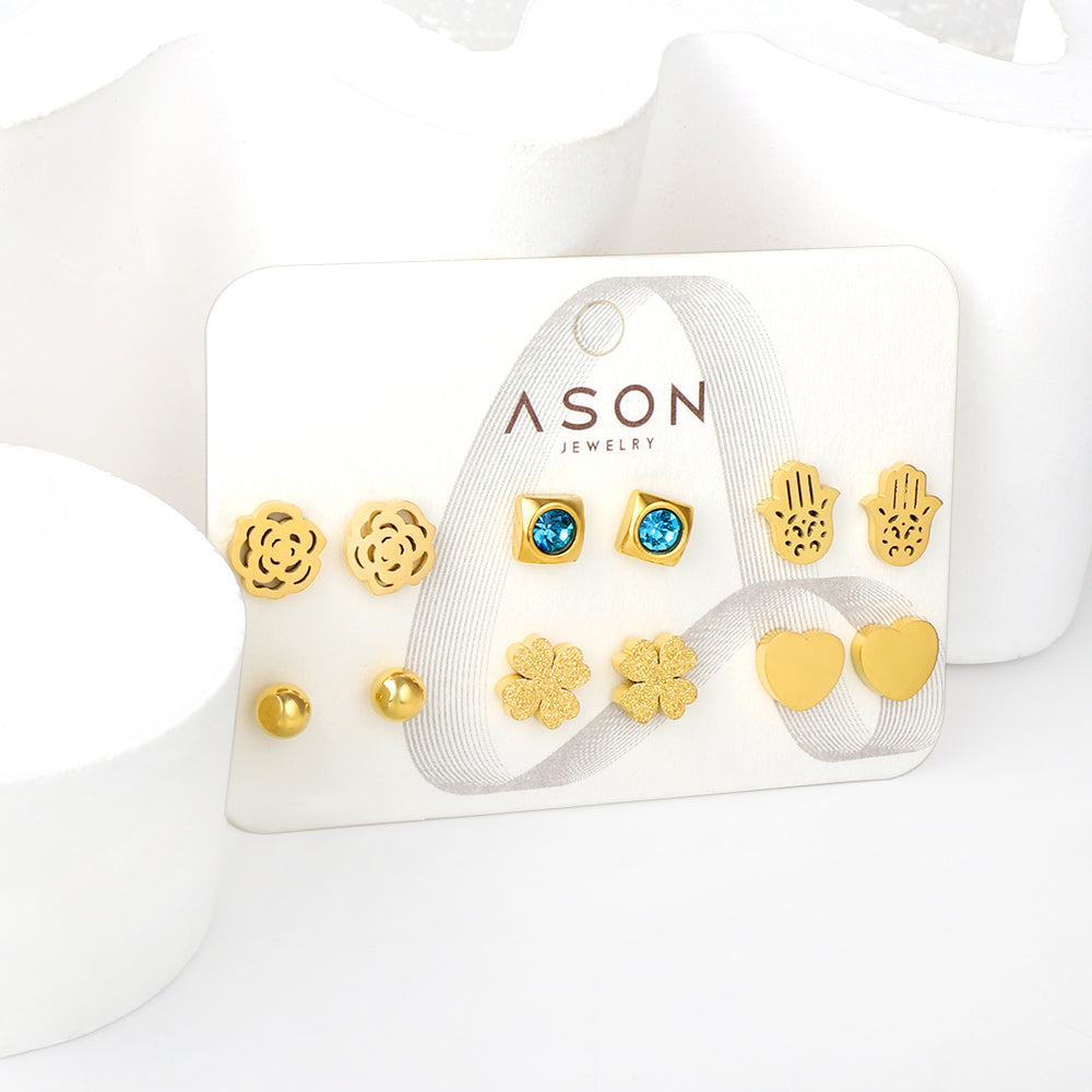 Six pairs of mixed card mounted cut-out palm / glossy heart stud earrings gold color