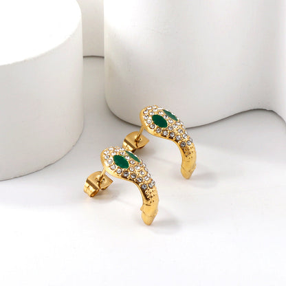Snake with white diamonds + green diamonds earrings in 18k gold