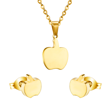 Gold/steel colored cut jewelry set with a golden apple on the cutting process