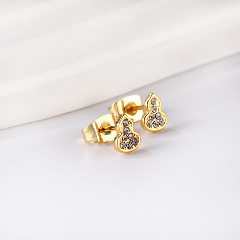 Gold gourd cut earrings with diamonds