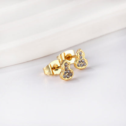 Gold gourd cut earrings with diamonds