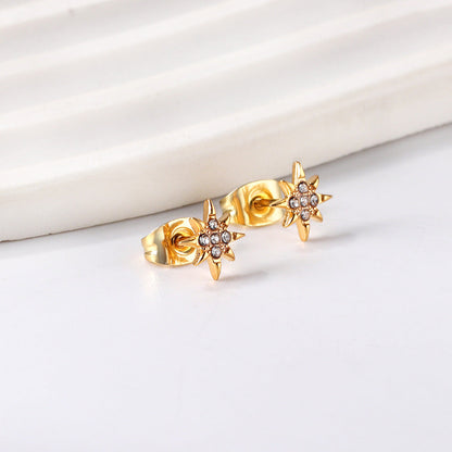 Golden lucky star cut earrings with diamonds