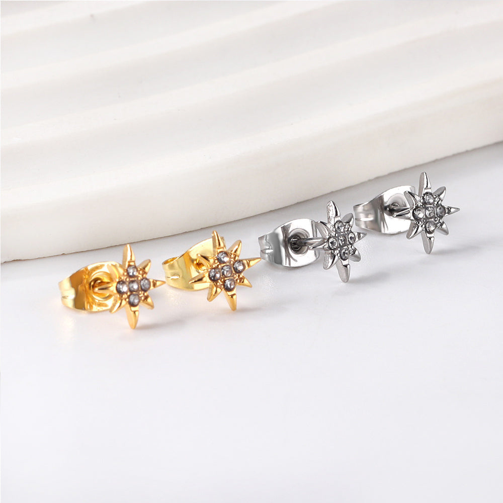 Golden lucky star cut earrings with diamonds