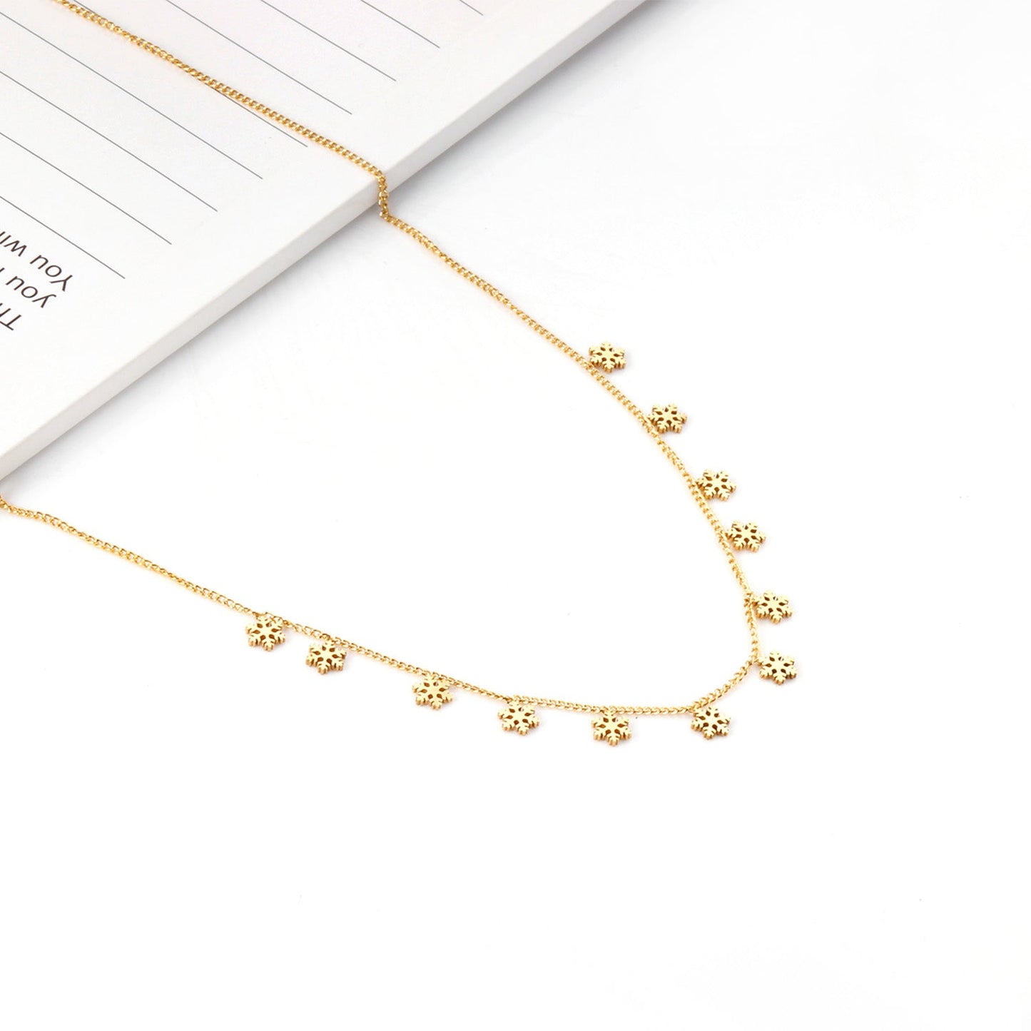 0.3 Side chain 40+5cm welded 12 x 4mm snowflake necklaces in glossy finish