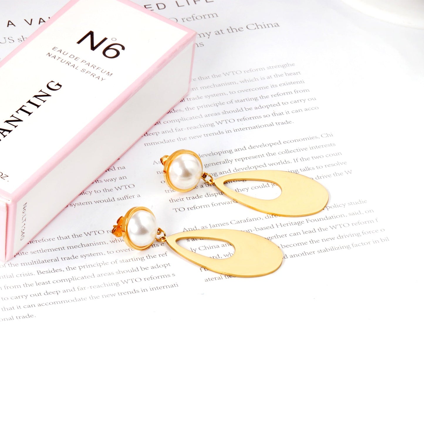 Half Pearl Glossy Oval Earrings
